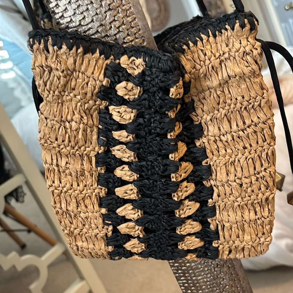 Free people, straw, beige, and black drawstring, small purse not been used